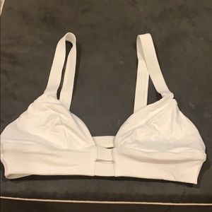 White Vitamin A swim top. No pads and Never worn.